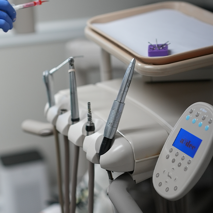 Row of dental instruments in a dental treatment room